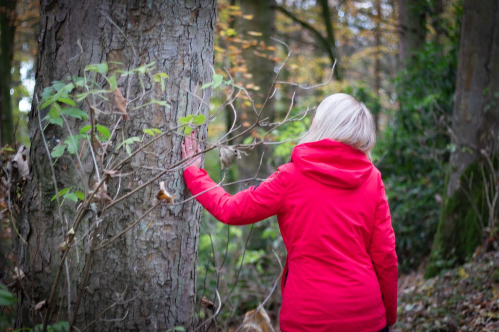 Liz Cooper walking through the forest 2